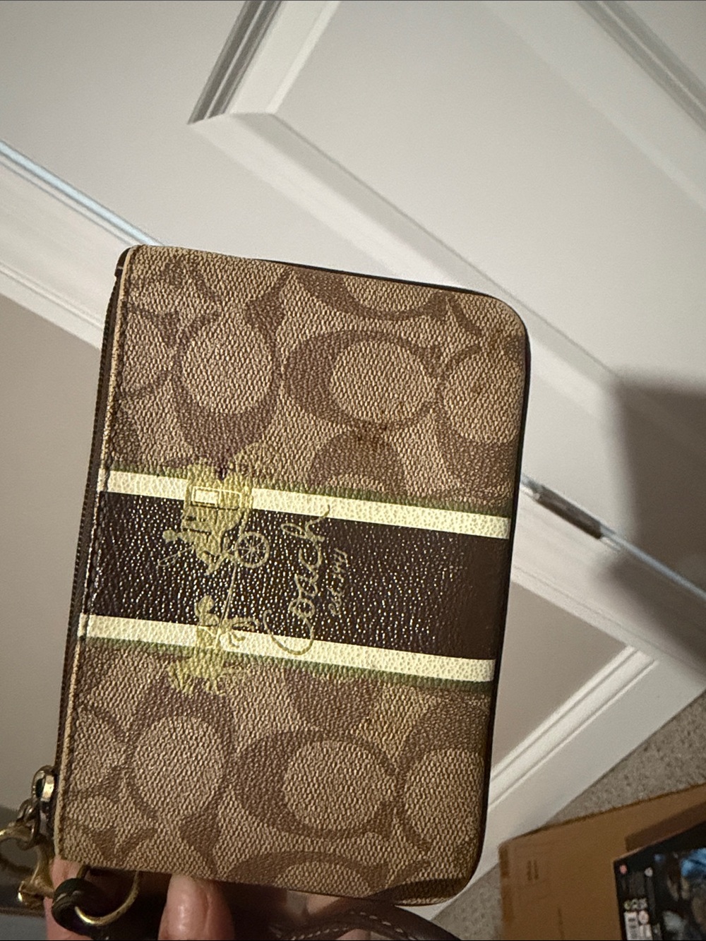 Coach Tan Signature Wristlet with Dark Brown Stripe and Gold Accent